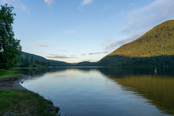 beautiful day at paul lake with blue sky and white clouds british columbia canada.