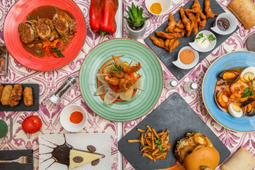 set of spanish food dishes