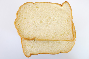 slices of bread on white background