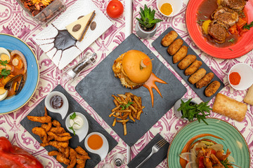 still life with assorted dishes of Spanish food