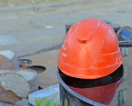 Construction Helmet On Barrel