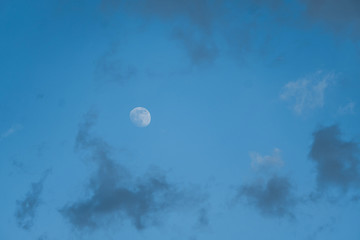 Moon on a blue sky