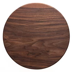 Poster Handmade black walnut round wooden chopping board. Walnut round wooden pallet. Black walnut wood plank texture background. © Guiyuan