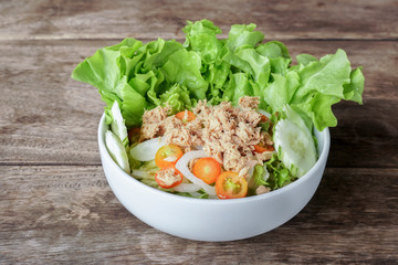 Tuna salad in white bowl.