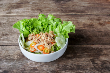Tuna salad in white bowl.
