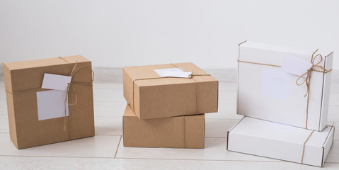 Many boxes with space for advertisement delivered from online store. Internet shopping and delivery concept.