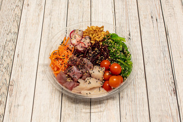 Poke bowl with fish and vegetables