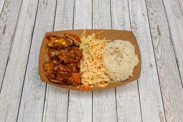Crispy chicken curry on tray