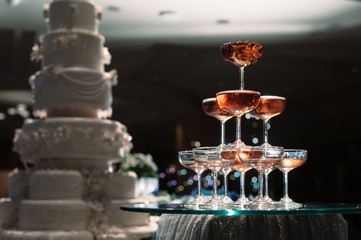 small tower of champagne's glass in wedding reception party