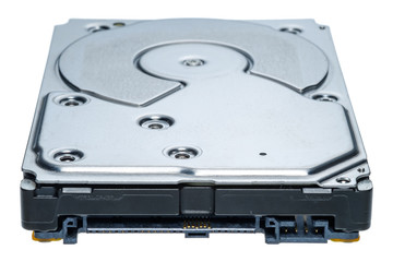 a computer's hard disk hdd data storage drive without shield isolated  in white background show magnetic disc and electronic part inside