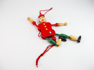 puppet Old wood Green and red puppet dolls On a white background.