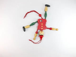 puppet Old wood Green and red puppet dolls On a white background.