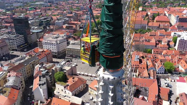 Zagreb Cathedral North Tower, damaged in Earthquake, preparing for controlled demolition by alpinists - Aerial Drone View