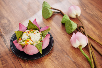 Traditional VIetnamese dish: cooked rice with vegetables decorated with lotus leaves and beautiful...