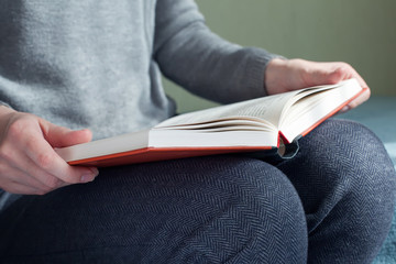 man reading a book