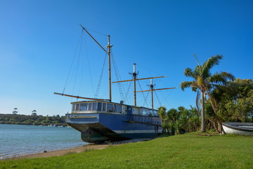 Boat moored on the beach, New Zealand