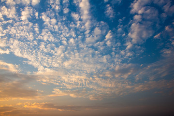 Scenic view of the sky with clouds during sunset in cityscape