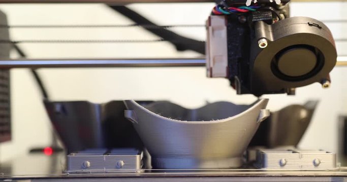 A set of face masks being 3D printed to for health care workers to help with the PPE shortage during the 2020 COVID-19 pandemic