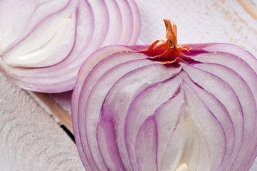 Red onion, lettuce. Health benefits, very rich in vitamins. Background for vegetables and garden plants and cooking.