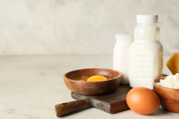 Different dairy products without lactose on light background