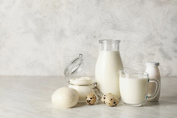 Different dairy products without lactose on light background