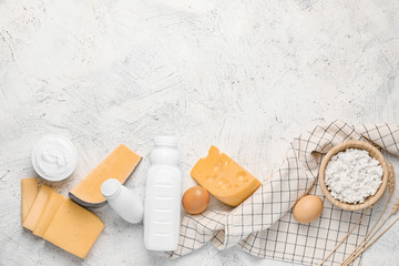 Different dairy products without lactose on light background