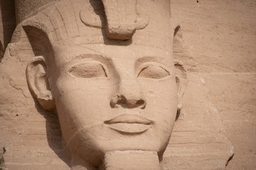 Fototapeta na wymiar Stone statue of Ramesses II in Abu Simbel temple, Egypt