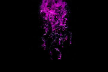 Colorful powder explosion on black background. Colorful dust explode. Paint Holi.