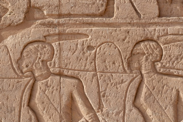 Numidian people carved in stone in Abu Simbel temple, Egypt
