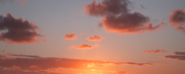 Colorful cloudy evening sky panorama