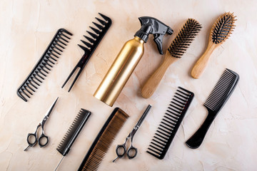 Hairdresser tools. Flat lay on grey background top view