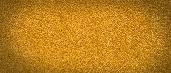 Naklejka premium Empty yellow cement wall texture background with pattern and copy space for design