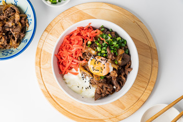 GYUDON Japanese beef & Rice,Japanese traditional dish Gyudon made from thinly sliced beef, onion, soy sauce and rice,food concept background