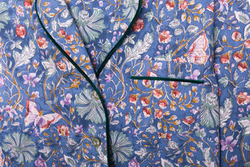 Close-up detail and fabric texture of a pajama. Homewear, sleepwear, shopping and sale concept.