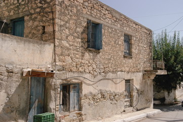 Fototapeta na wymiar Architecture of an old brick house in Greece