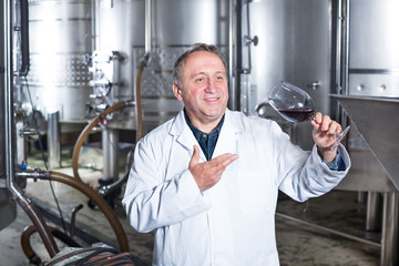 Mature male with glass of wine