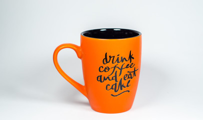 Bright orange ceramic cup