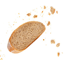 Bread slices and crumbs isolated on white background. Top view.