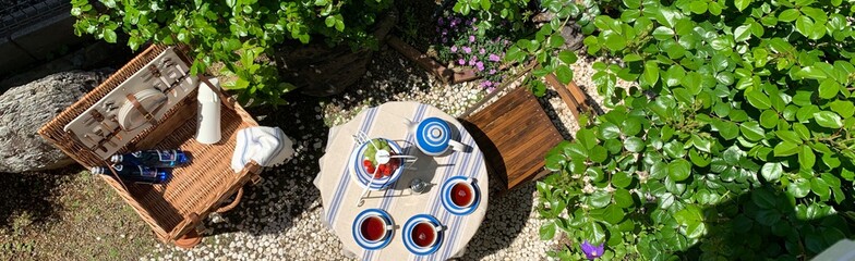 Tea time in the fresh green garden living