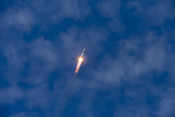 Baikonur, Russia - 10.23.12: Rocket Soyuz in the sky with clouds