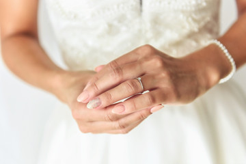 Obraz na płótnie Canvas Beautiful engagement ring on a lady's hand .