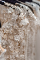 Wedding dresses hanging on a hanger. Fashion look.