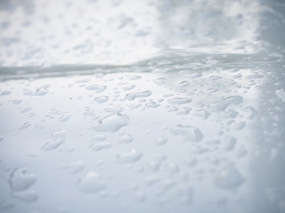Obraz premium The rain drops on the car annoyed me every time after washing the car.
