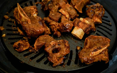 Grilled beef ribs on the stove.