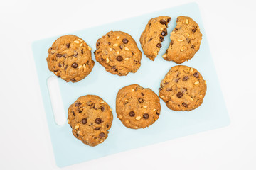 Chocolate Chip Cookies. Fresh baked dessert close up on white background, view from above