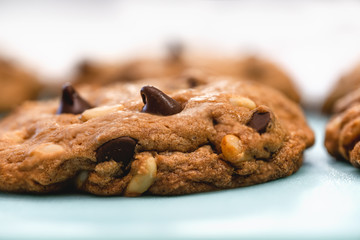 Chocolate chip cookies with pine nuts. Homemade old-fashioned Chocolate Chip Cookies close up. American cuisine, dessert
