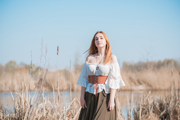 Medieval modern slavic style, woman in cotton blouse, belt and skirt