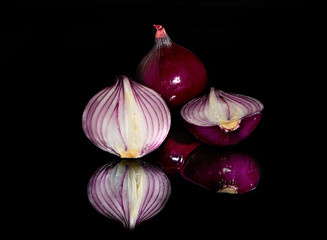 red onion on a black background