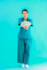 Portrait beautiful young asian doctor woman show money and cash