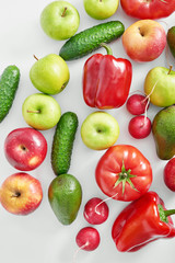 Different vegetables and fruit isolated on white background.